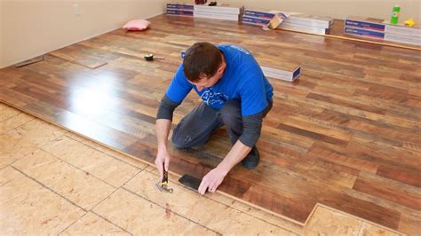 Remove the spacers between the tile, and press grout into the joints with a rubber float and then pull the grout across the lines diagonally, removing the excess. . Lowes flooring installation